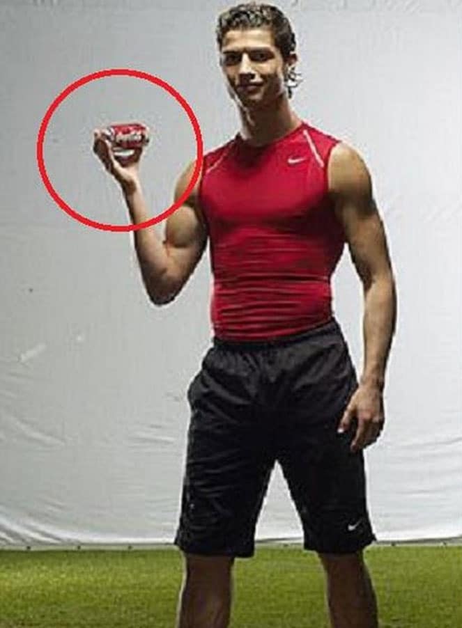 Ronaldo Coca Cola stunt while drinking coca cola his entire life posing with coca cola in his hand an old picture