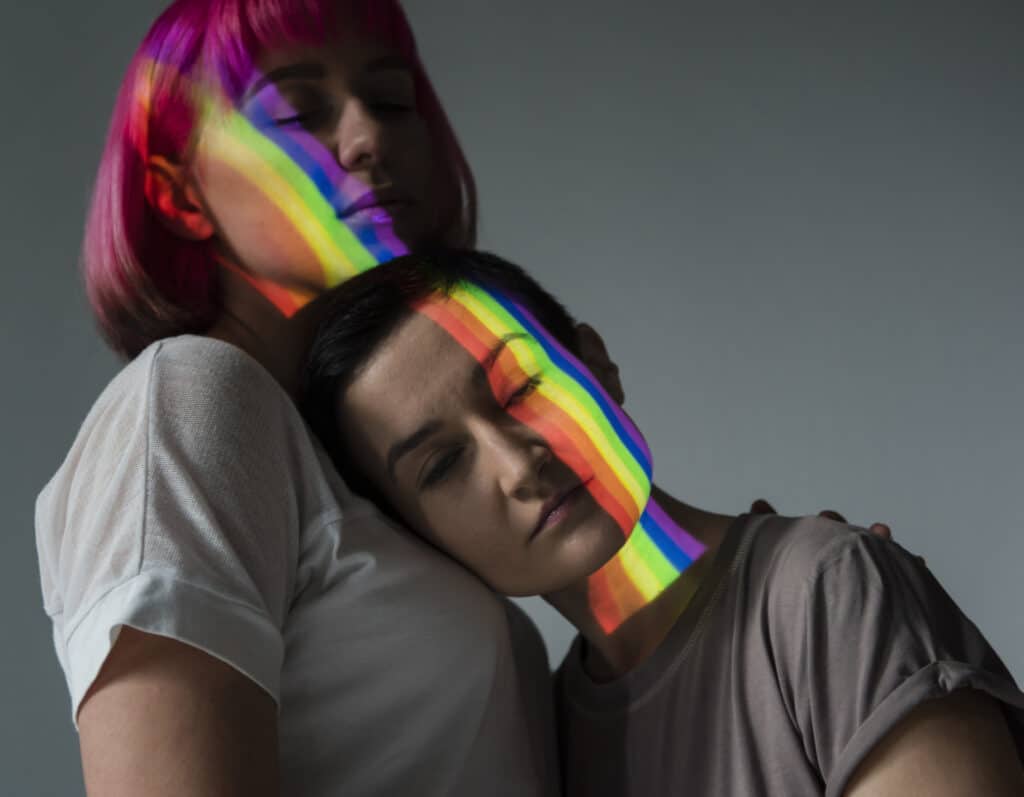 lesbian couple with lgbt symbol