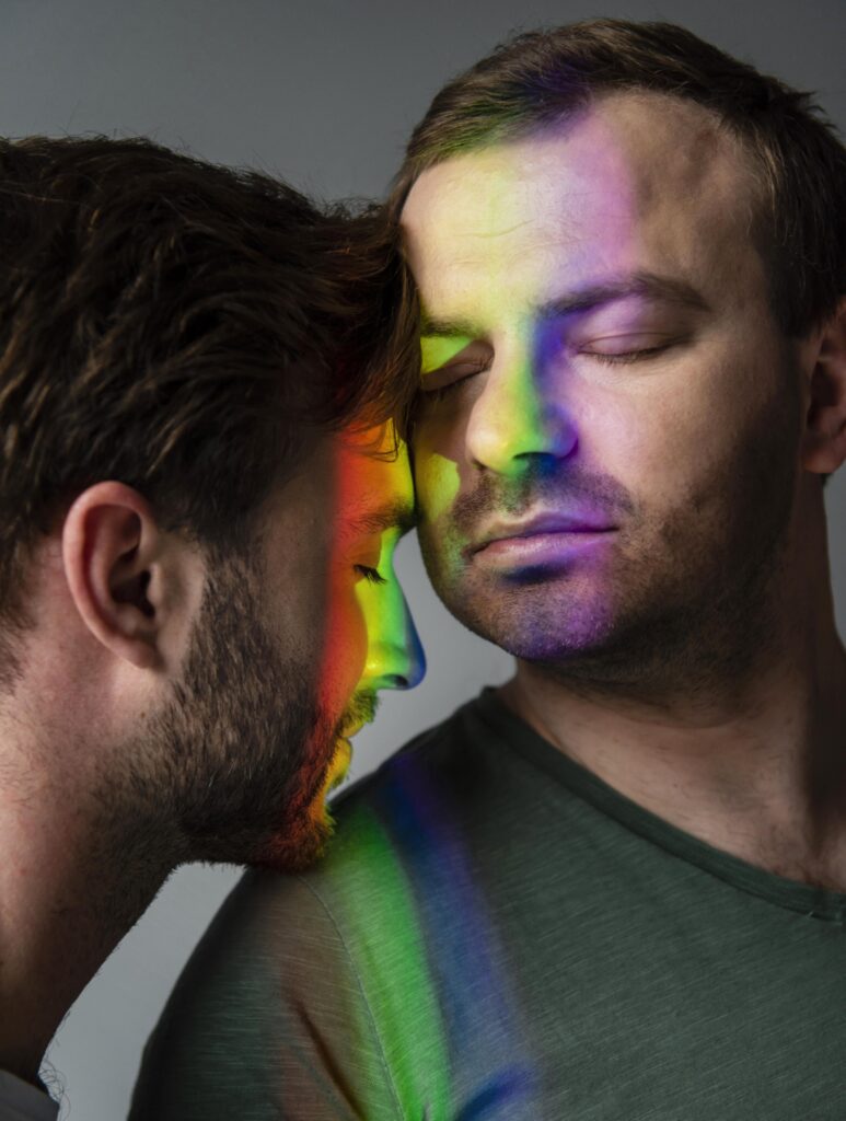 lgbt community couple with rainbow symbol